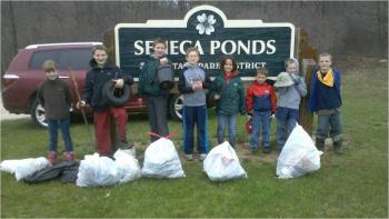 Kids taking Group photo after picking up trash at Seneca Pond