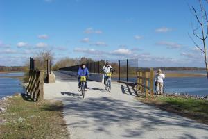 Cyclists and Birdwatcher on trail