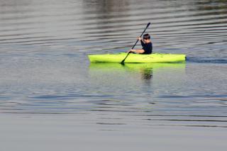 person in kayak on the water