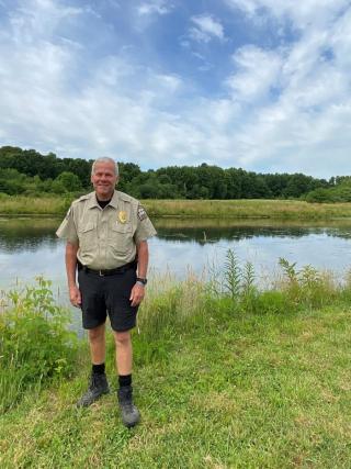 Chief Ranger Kevin Nietert photo standing near pond