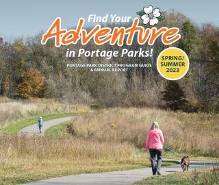 cover of program guide featuring people walking on path and says "find your adventure in Portage Parks!"