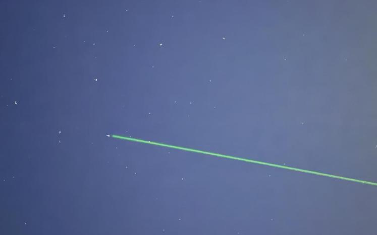 Photo by Kim Jackson laser pointing at stars