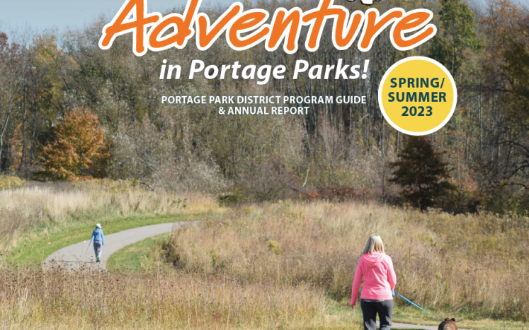 cover of program guide featuring people walking on path and says "find your adventure in Portage Parks!"